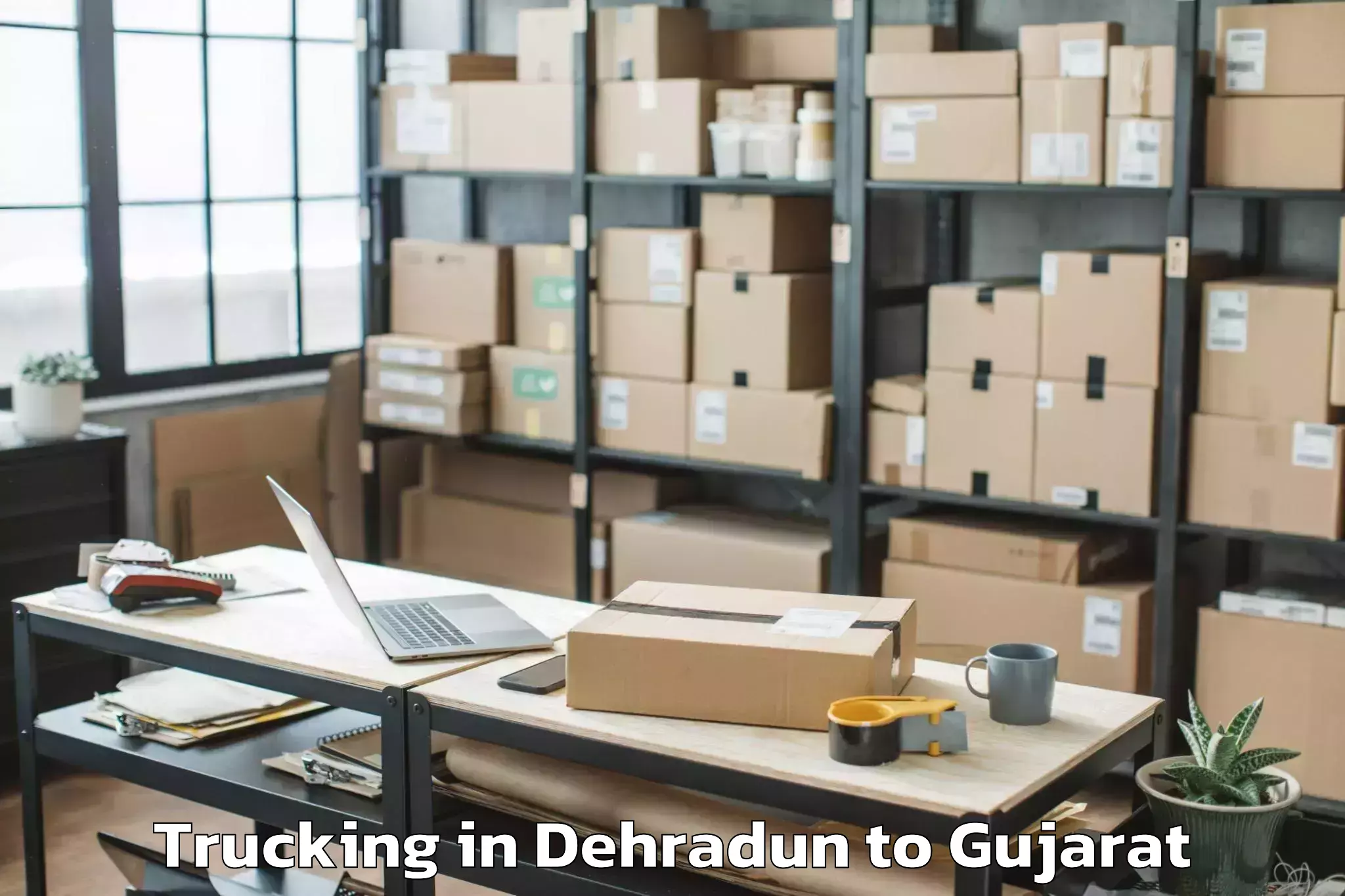 Book Dehradun to Dhansura Trucking